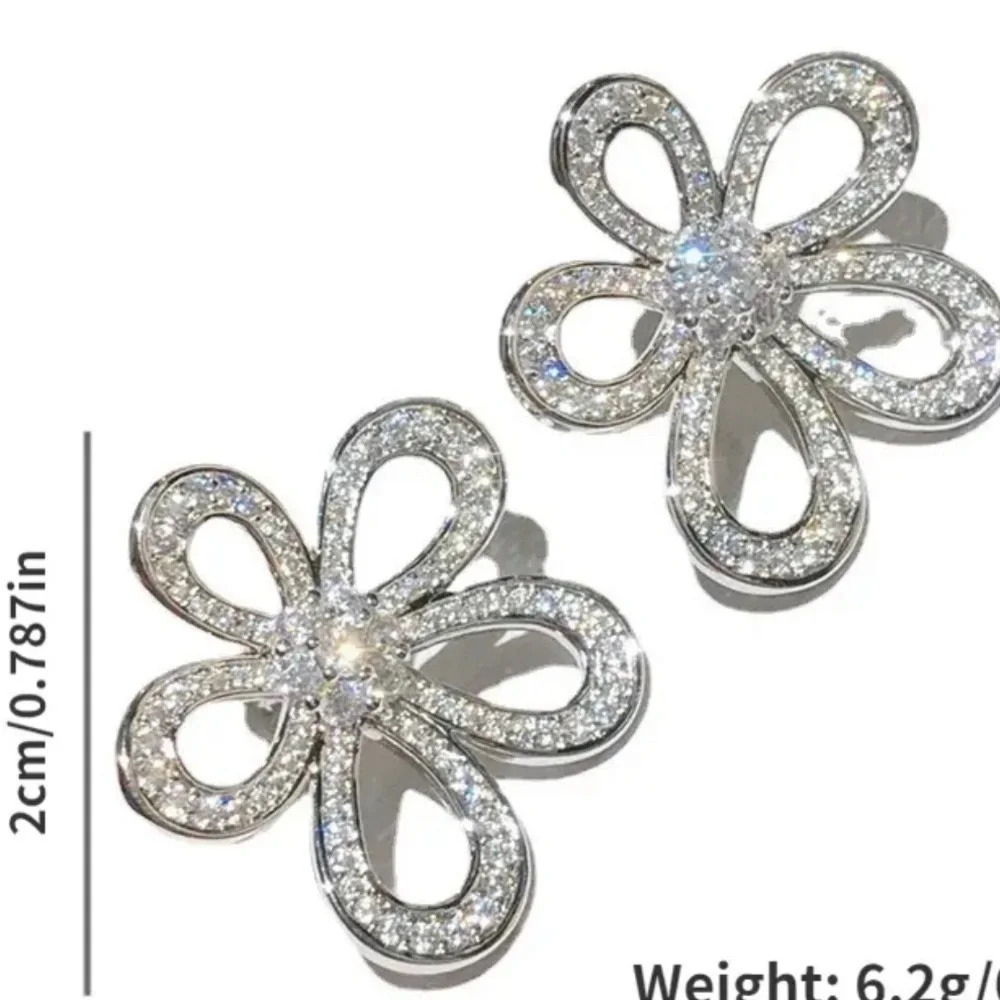 Floral silvertone rhinestone earrings - new in package. - Picture 3 of 5